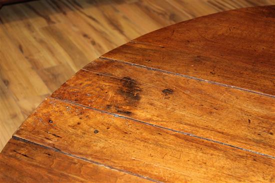 An 18th century walnut oval gateleg dining table, extended 4ft 9in.